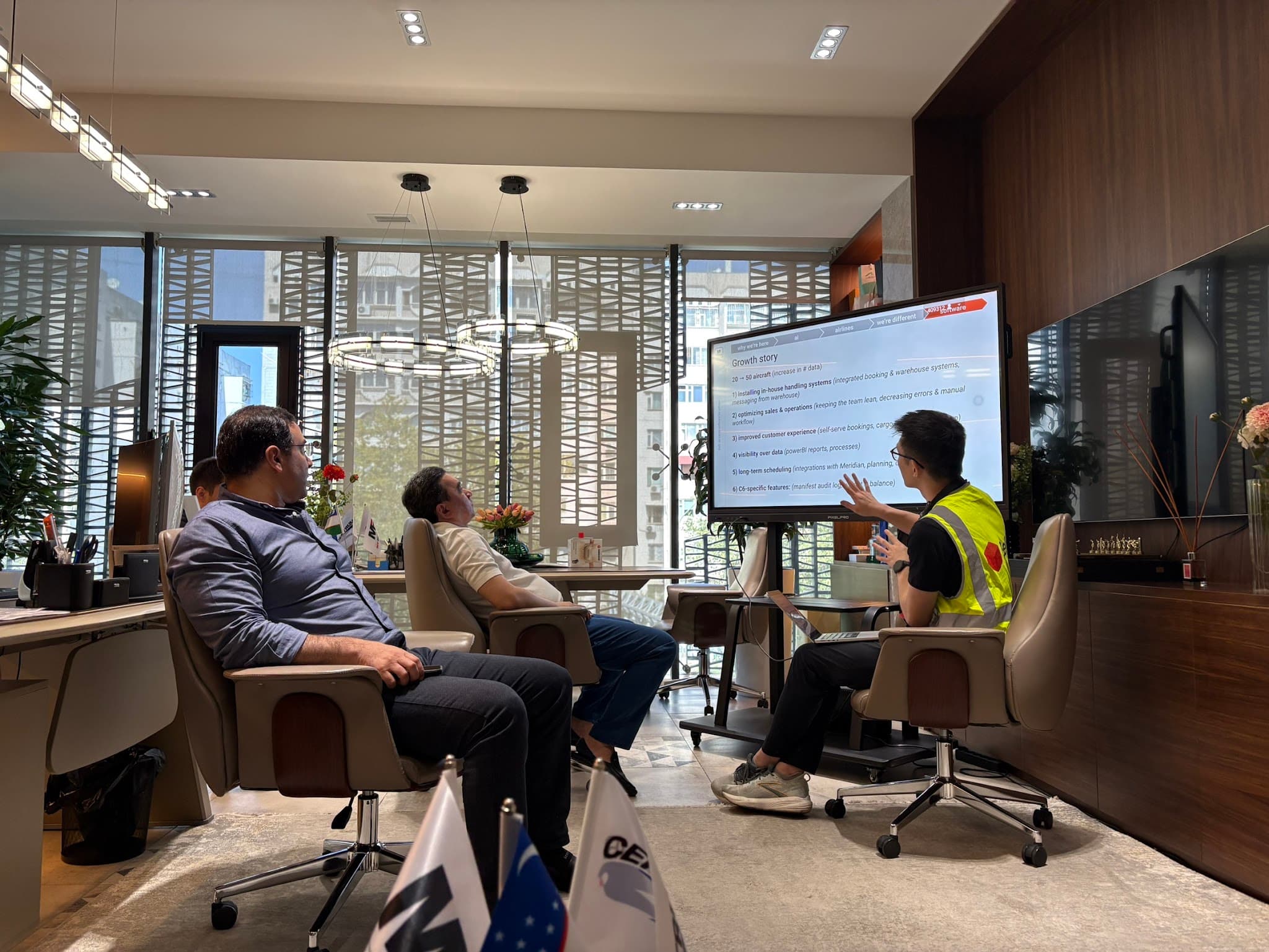 Belli presenting to the My Freighter team in their Tashkent office