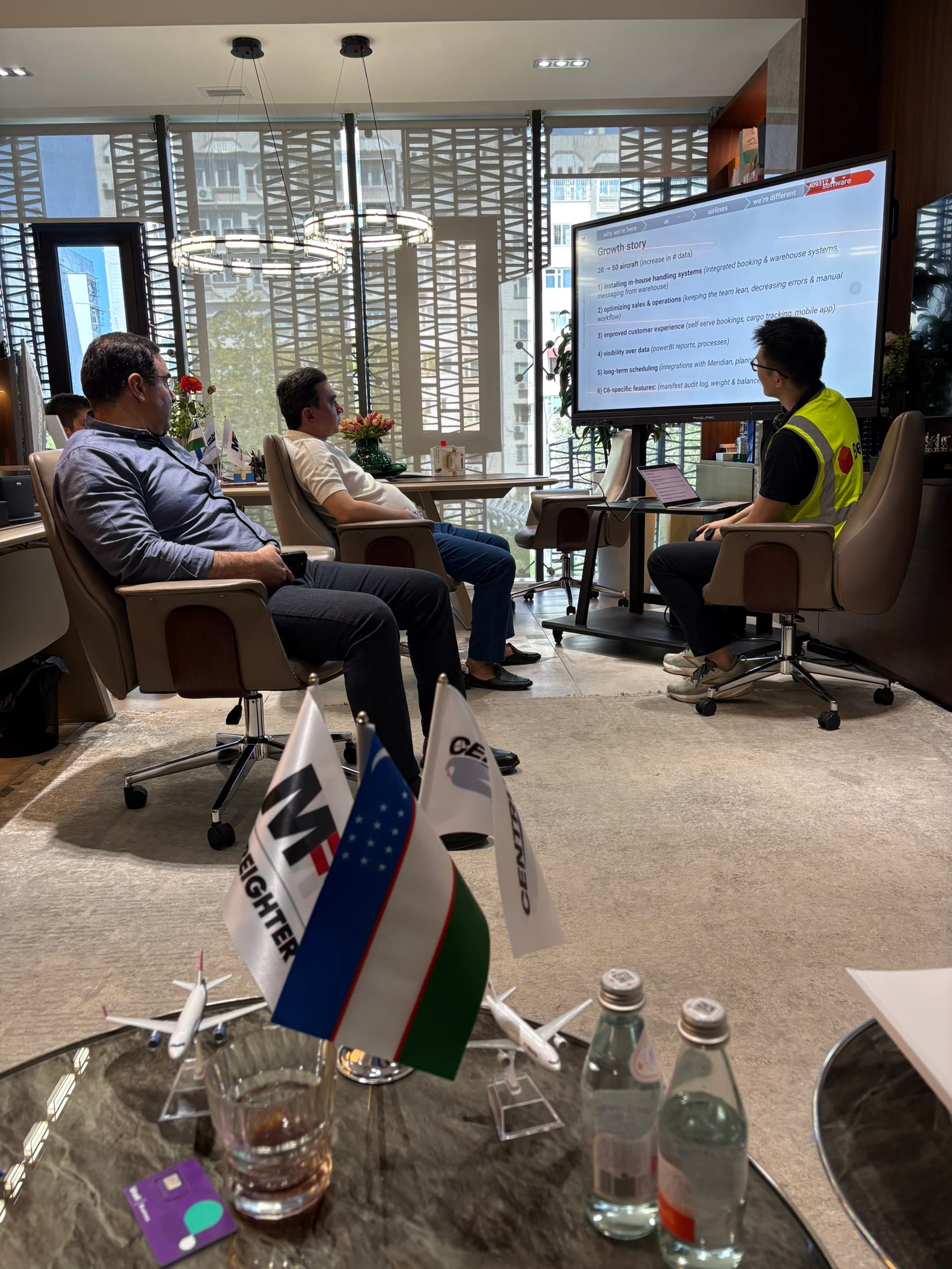 My Freighter and Uzbek flags on the table during a Belli presentation